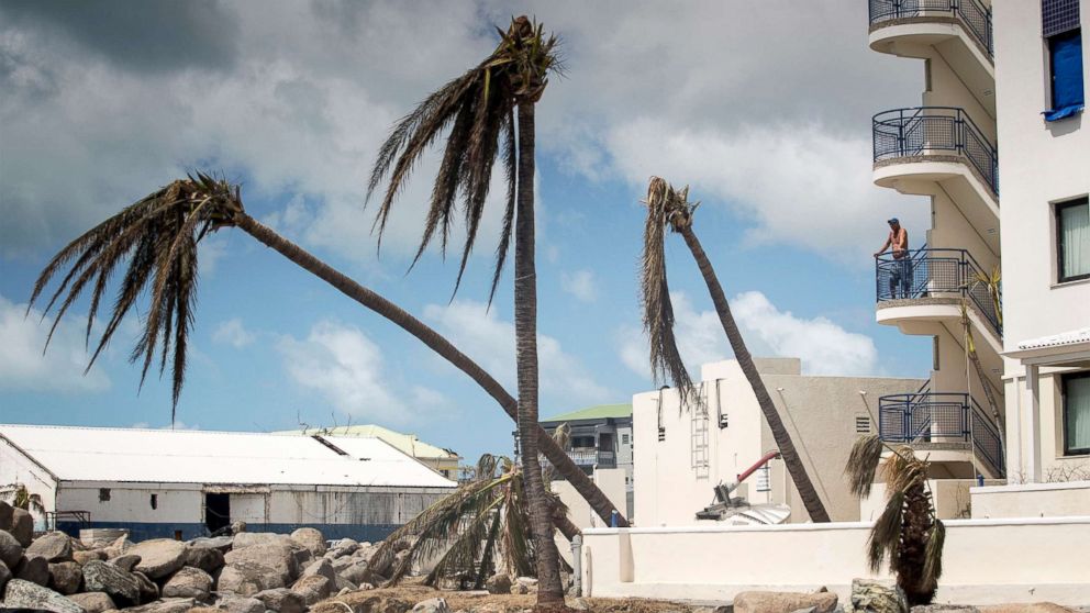 PHOTO: This handout photograph provided courtesy of the Dutch Department of Defense on Sept. 8, 2017, shows a man looking on over the devastation of Hurricane Irma on the Dutch Caribbean island of St. Martin.