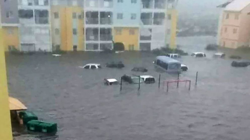 PHOTO: Cars sit on a flooded street on the island of Saint-Martin after Hurricane Irma passed through the Caribbean islands, Sept. 6, 2017.
