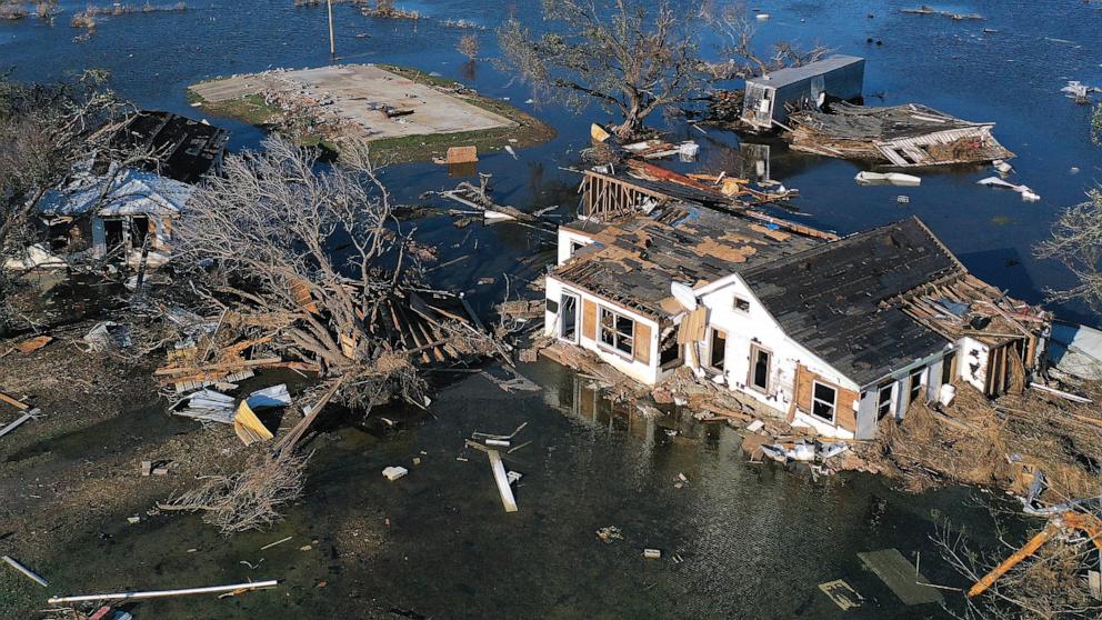 PHOTO: In this Oct. 10, 2020, file photo, an aerial view of flood waters from Hurricane Delta is shown surrounding structures destroyed by Hurricane Laura, in Creole, Louisiana. 
