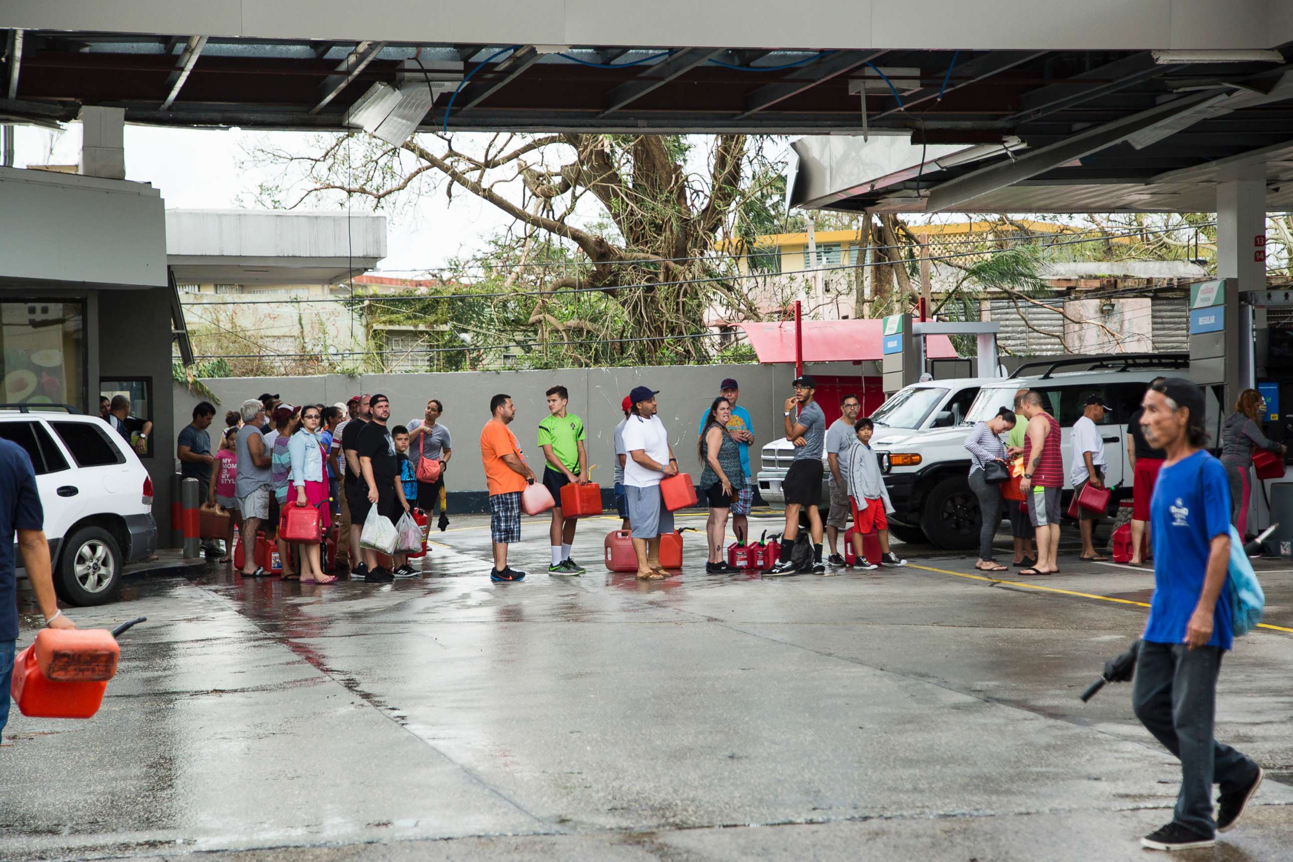 PHOTO: People line up to fill gas cans after Hurricane Maria in San Juan, Puerto Rico, Sept. 21, 2017.