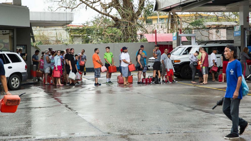 PHOTO: People line up to fill gas cans after Hurricane Maria in San Juan, Puerto Rico, Sept. 21, 2017.