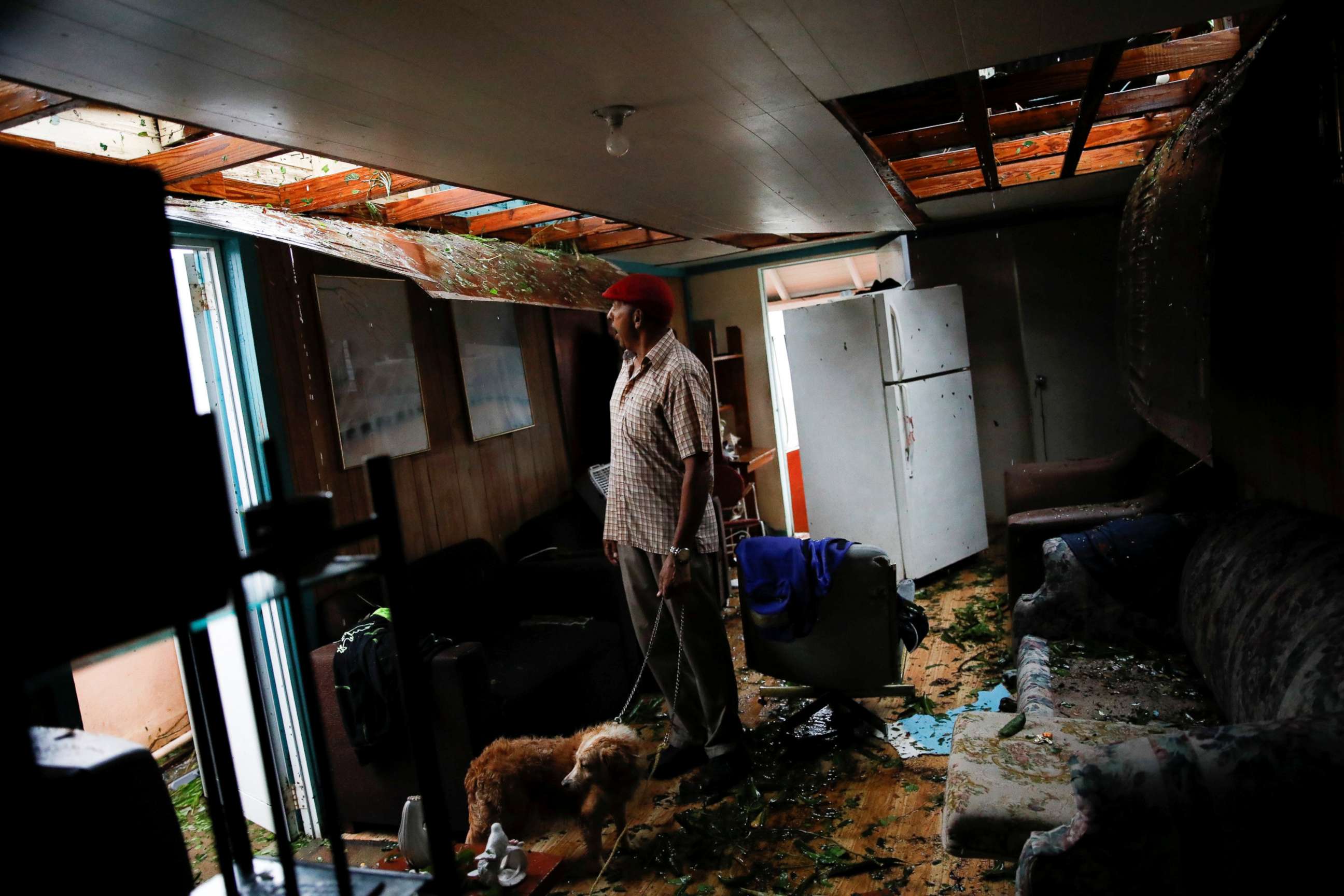 PHOTO: Agapito Lopez looks at the damage in his house after the area was hit by Hurricane Maria in Guayama, Puerto Rico, Sept. 20, 2017. 