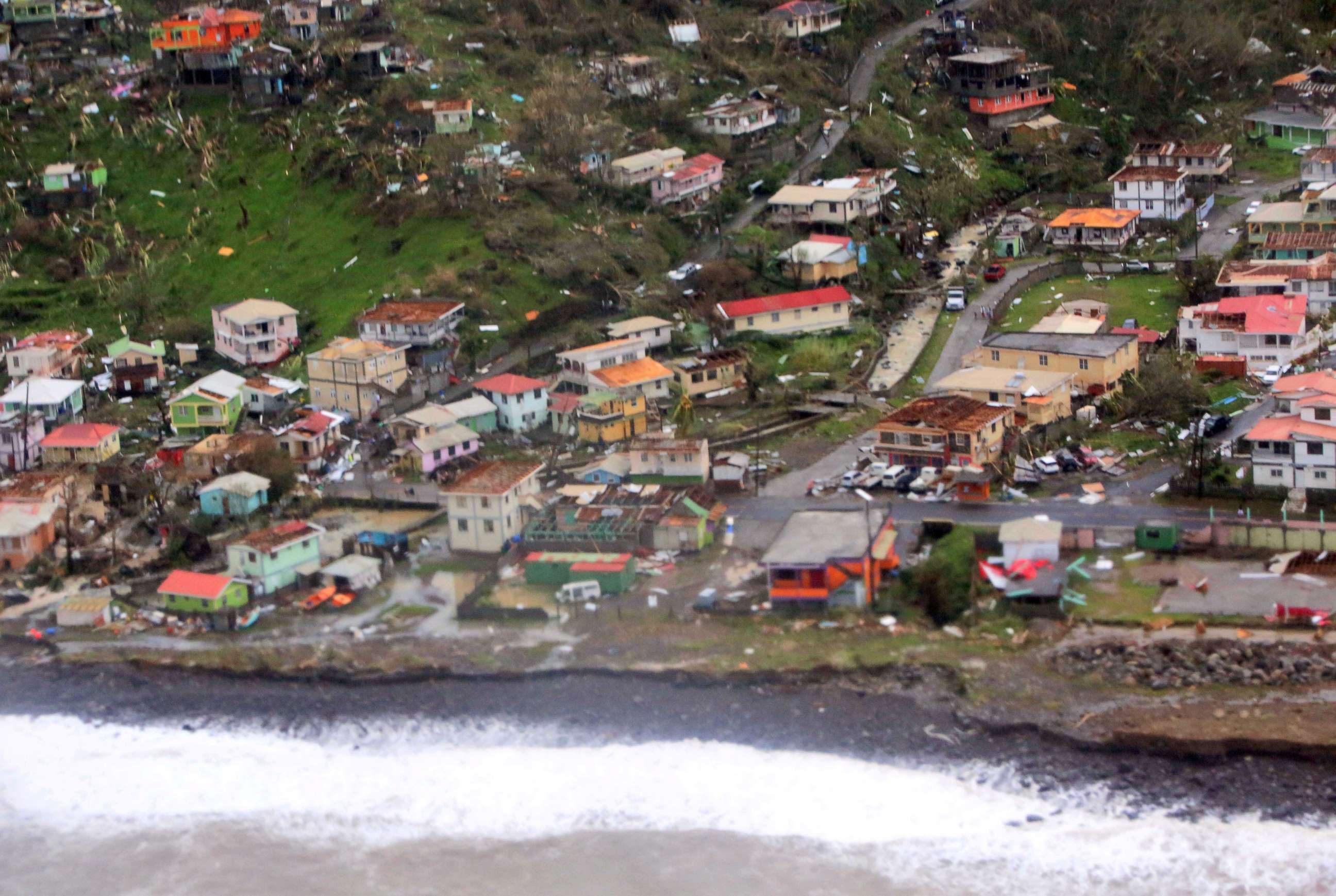 PHOTO: Damaged homes from Hurricane Maria are shown in this aerial photo over the island of Dominica, Sept.19, 2017. 