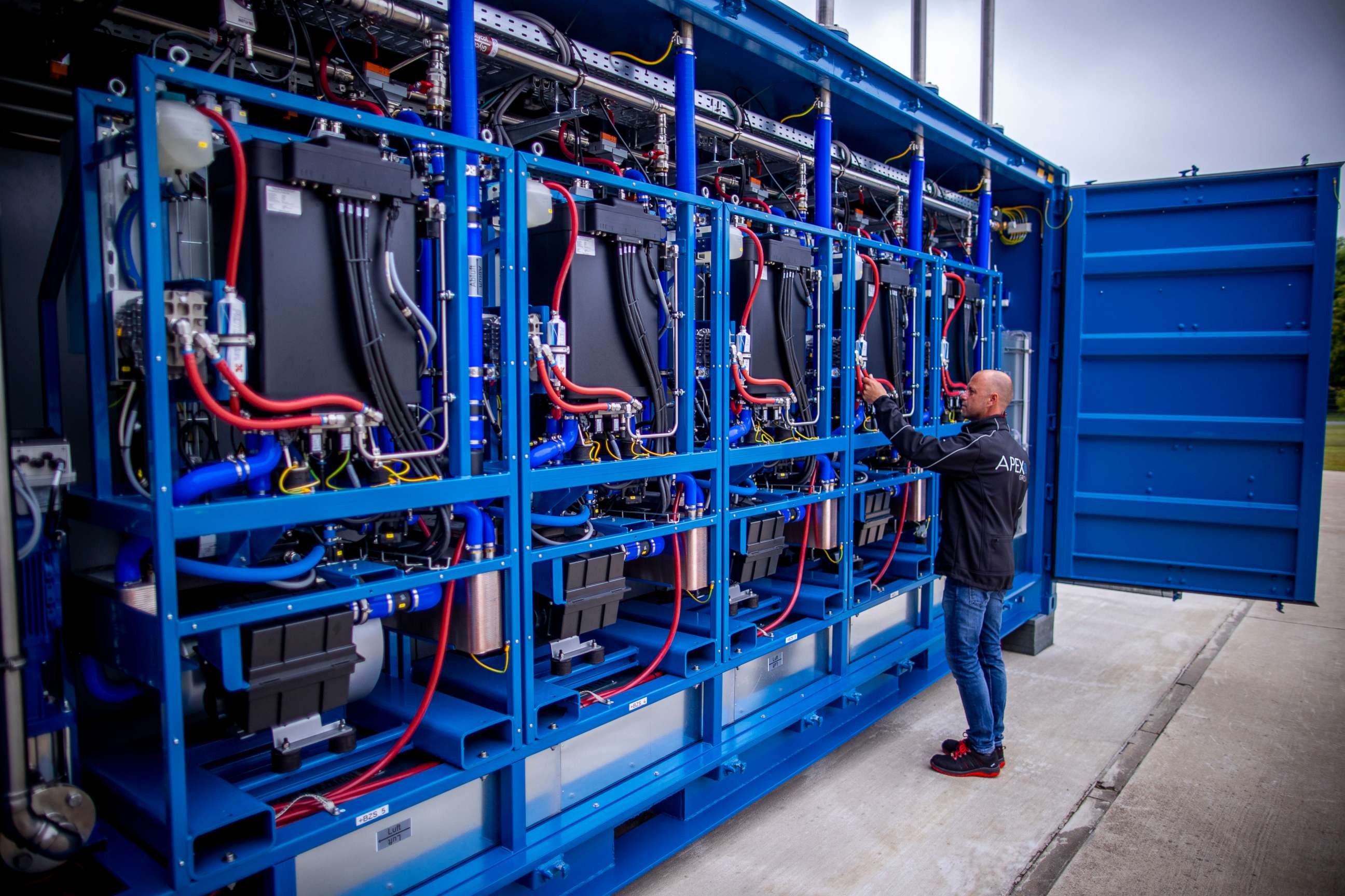 PHOTO: Plant manager Guido Konig from Apex Energy tests the fuel cell in what the company says is the largest grid-connected hydrogen power plant in Europe, in Laage, Germany, June 12, 2020.