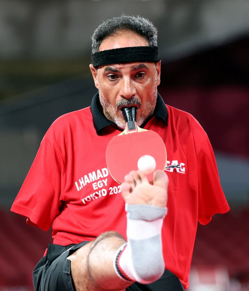 PHOTO: Ibrahim Elhusseiny Hamadtou of Egypt in action against Chao Chen of China at the Paralympic Games in Tokyo, Aug. 27, 2021.