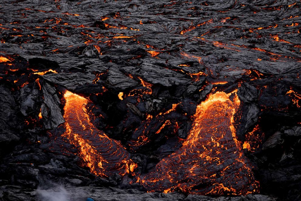 PHOTO: Lava continues to ooze from a volcano near Reykjavik following an eruption, in Iceland, March 21, 2021.
