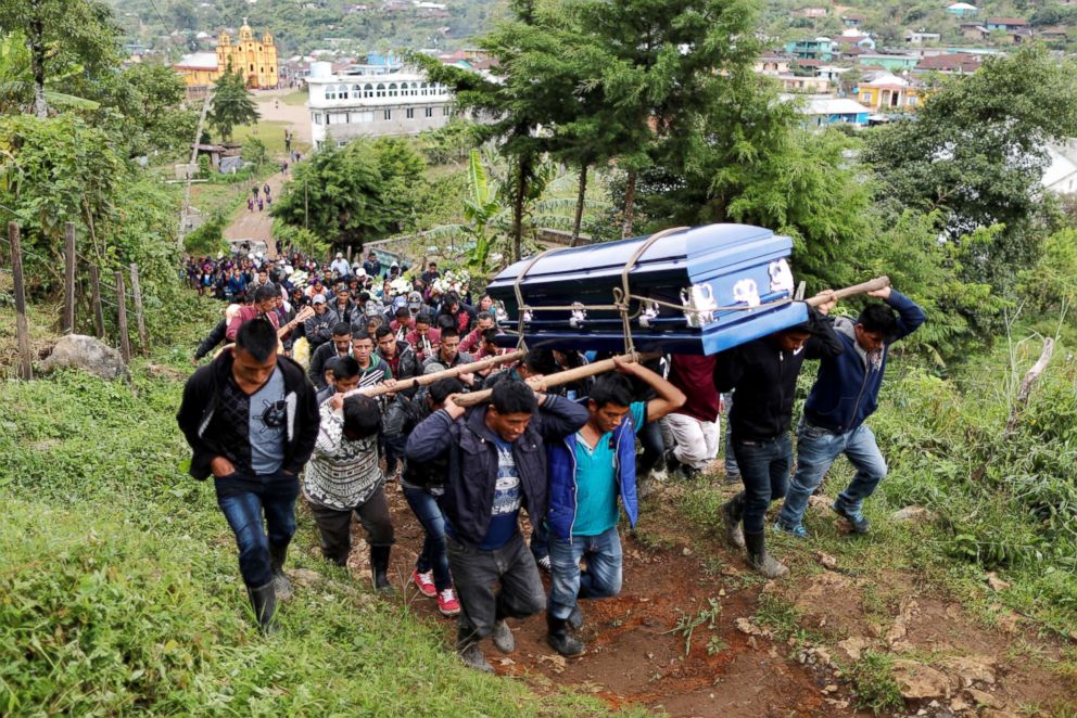 PHOTO: Pallbearers carry the coffin of Misael Paiz, 25, to his funeral in Aguacate, Huehuetenango, Guatemala, Oct. 29, 2018.