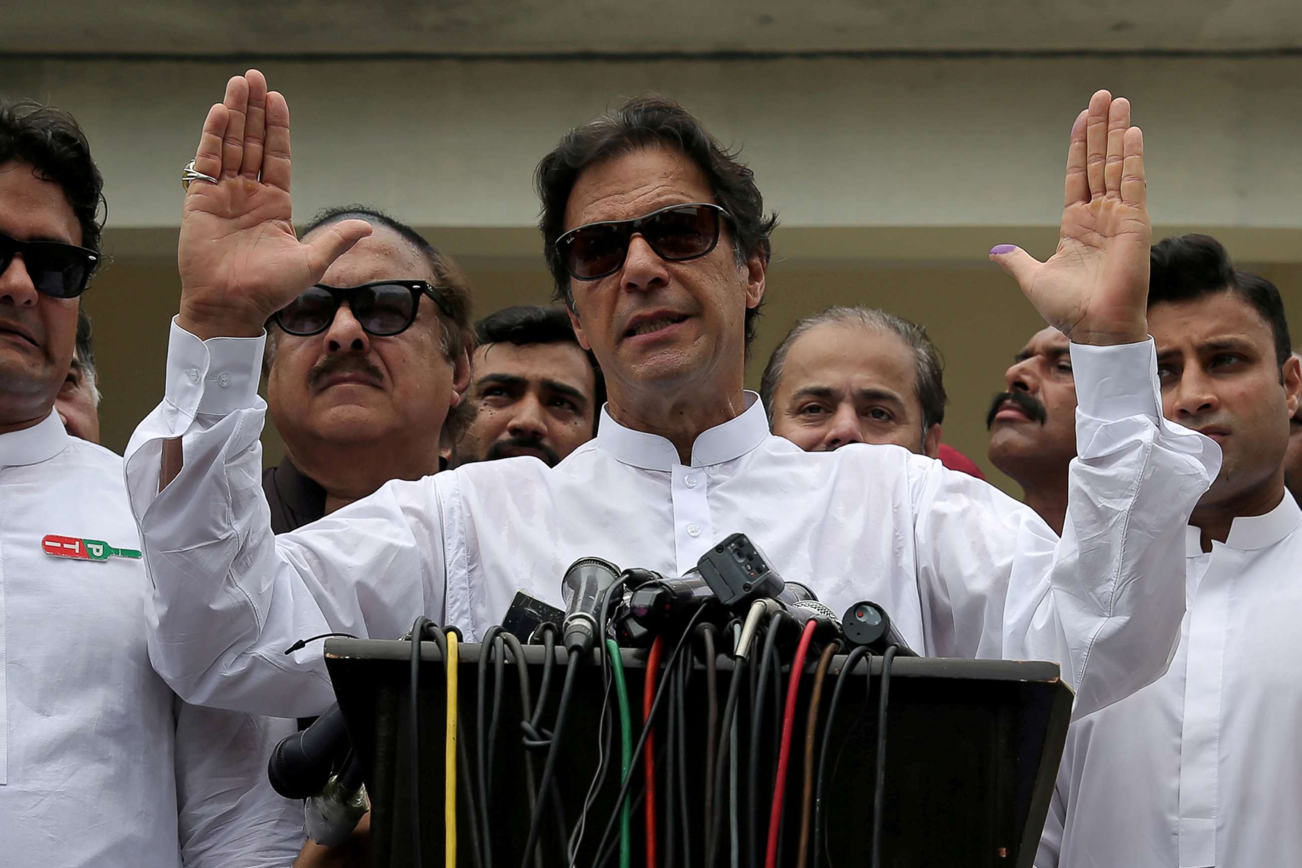 PHOTO: Imran Khan, chairman of Pakistan Tehreek-e-Insaf (PTI), speaks after voting in the general election in Islamabad, July 25, 2018.