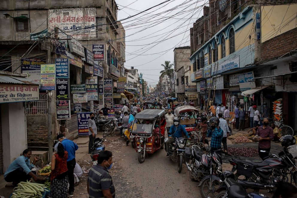 PHOTO: People attend a street market during a nation-wide imposed lockdown during the coronavirus disease (COVID-19) outbreak, in Bhagalpur, Bihar, India, July 29, 2020.