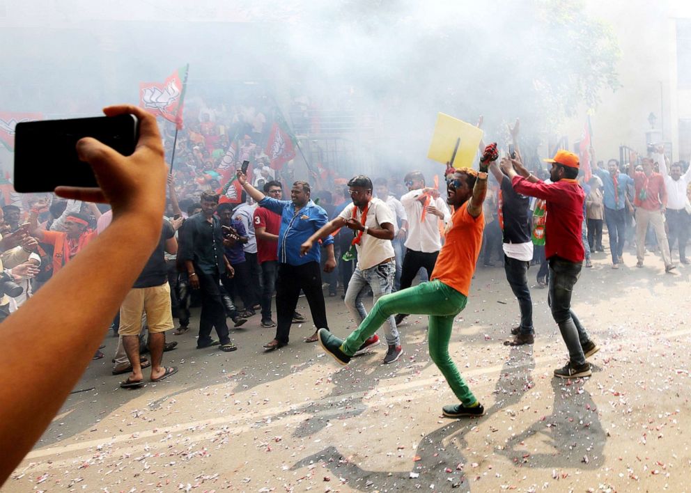 PHOTO: Bharatiya Janata Party (BJP) supporters celebrate BJP's potential win as votes are counted for the Lok Sabha election in Bangalore, India, May 23, 2019.