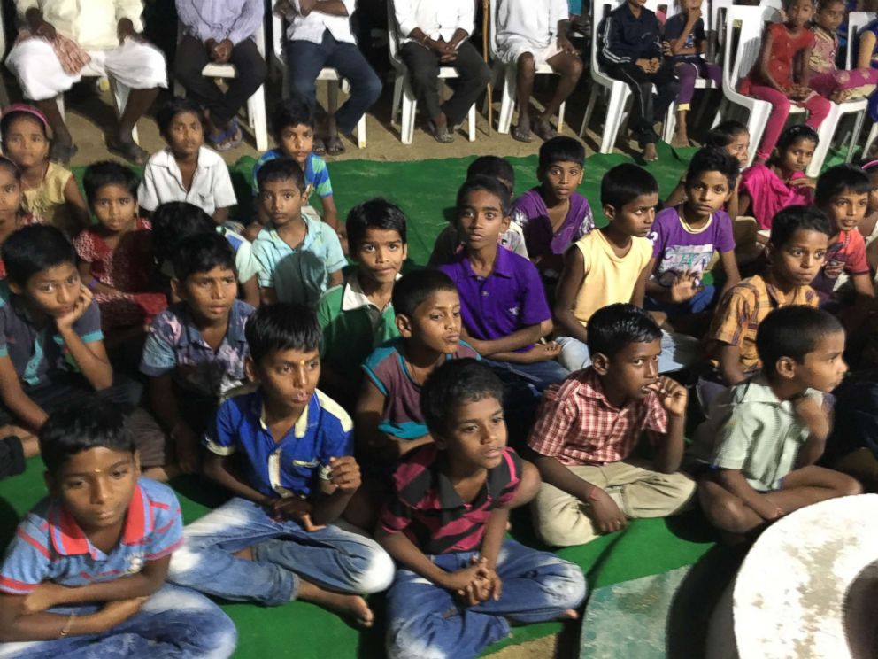 PHOTO: Children watch as performers arrive on stage in Chinnadaripally, India, on Sept. 30, 2018, to teach villagers about the dangers of rumors spread via WhatsApp.