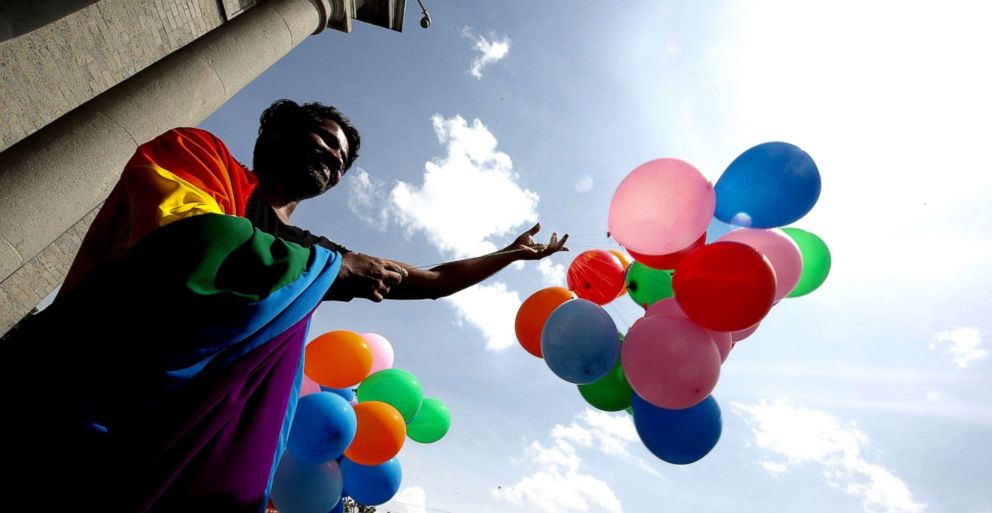 PHOTO: Indian activists of the lesbian, gay, bisexual, and transgender (LGBT) community celebrate in Bangalore, India after hearing the Supreme Court verdict striking down a colonial-era law criminalizing gay sex on Sept. 2018. 