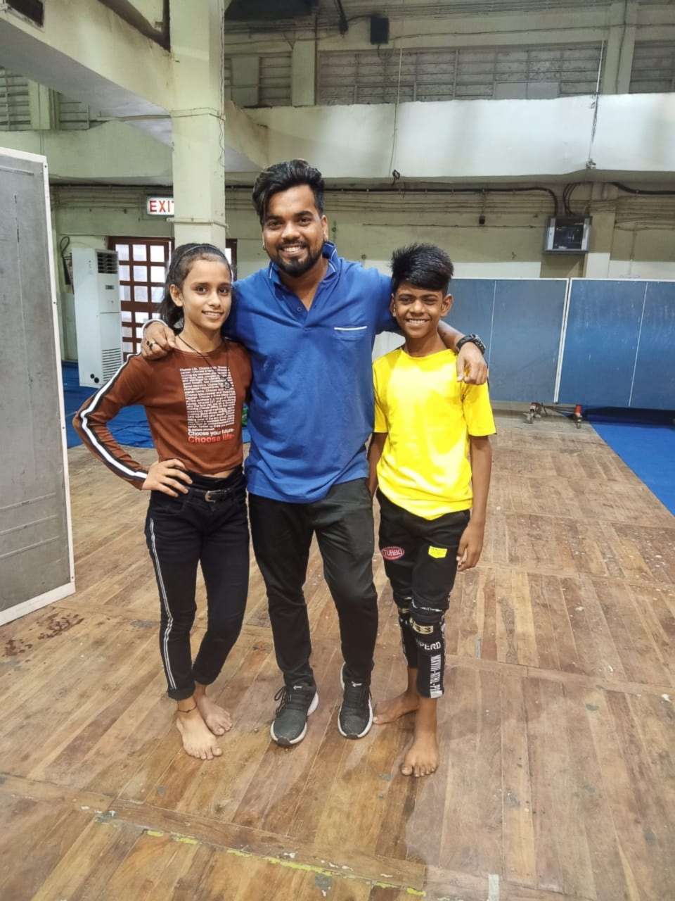 PHOTO: Jashika Khan,11 and Mohammad Azajuddin,12  along with their dance coach, Shekhar Rao. 