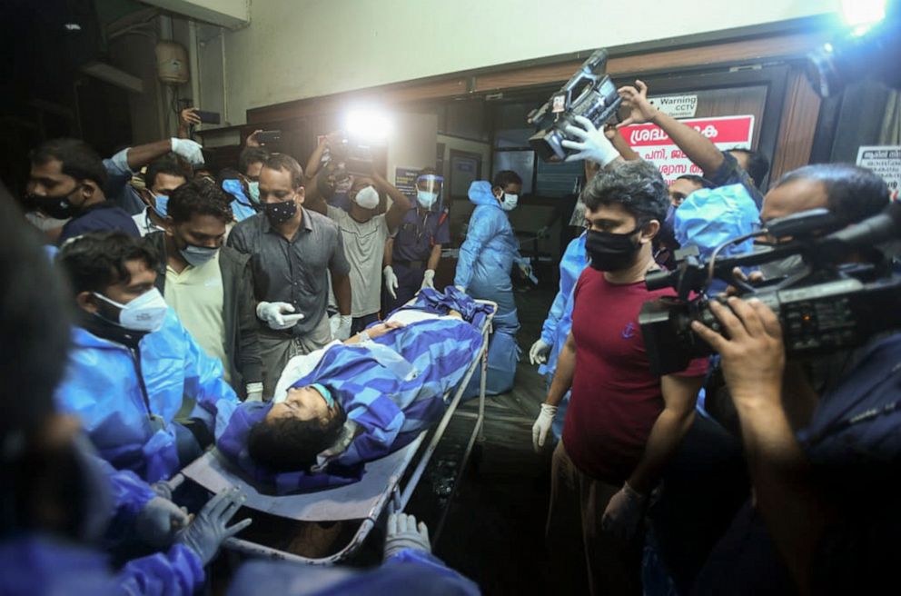 PHOTO: A person injured after an Air India Express flight skidded off a runway while landing at the Kozhikode airport is brought for treatment to the Medical College Hospital in Kozhikode, Kerala state, India, Aug. 7, 2020.