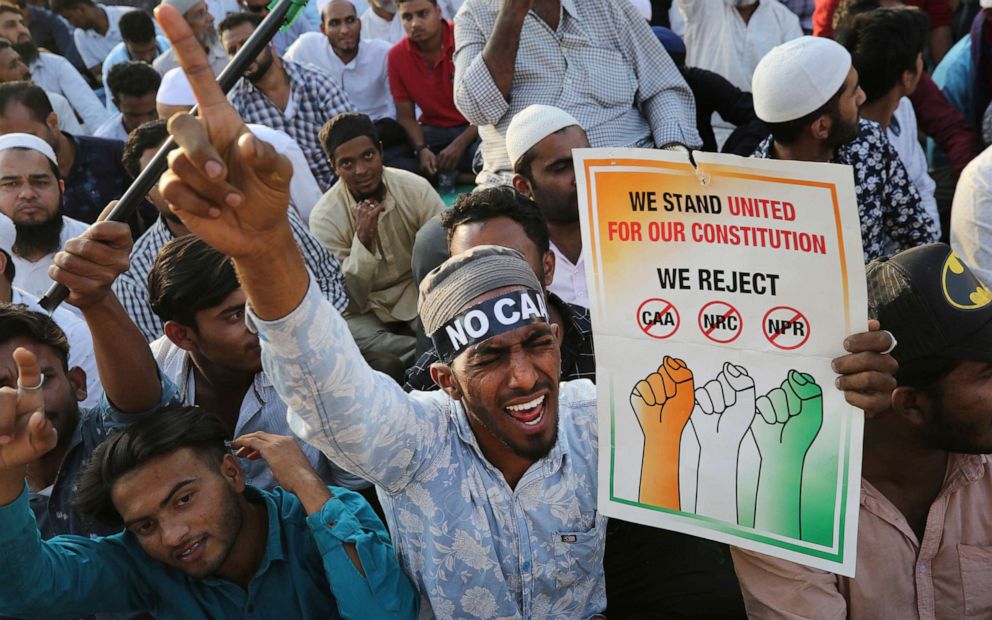 PHOTO: Indians shout slogans as they participate in a protest against a new citizenship law that opponents say threatens India's secular identity in Bangalore, India, Feb. 20, 2020.