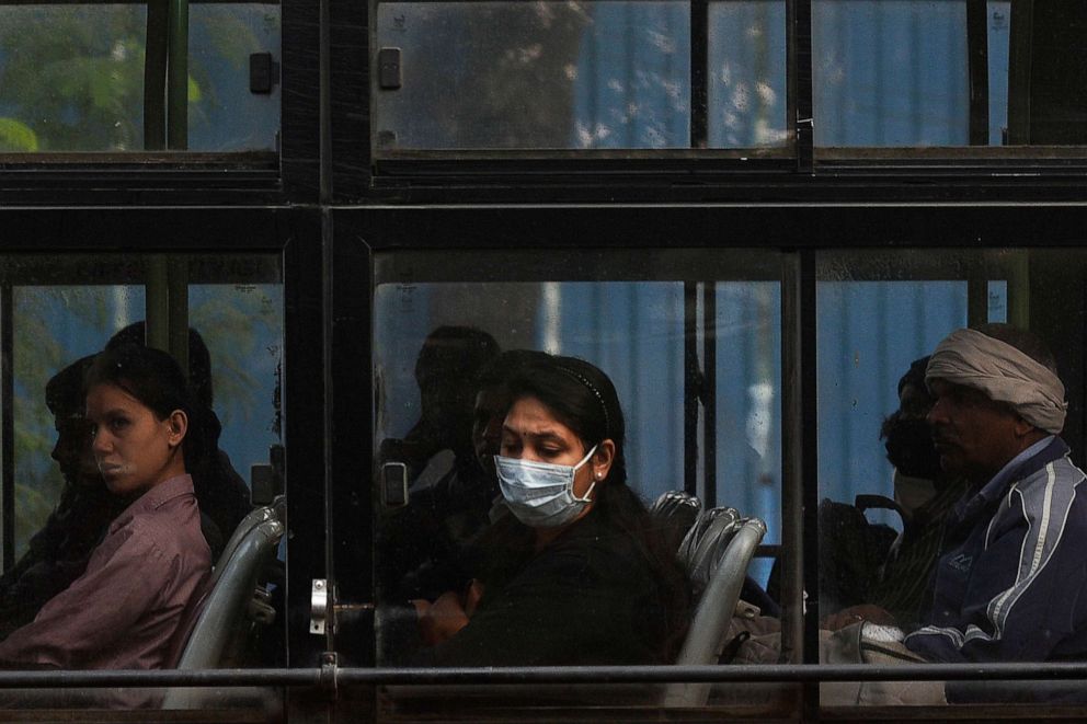 PHOTO: People wear pollution masks to protect against air pollution in Dehli, India, Oct. 28, 2019.