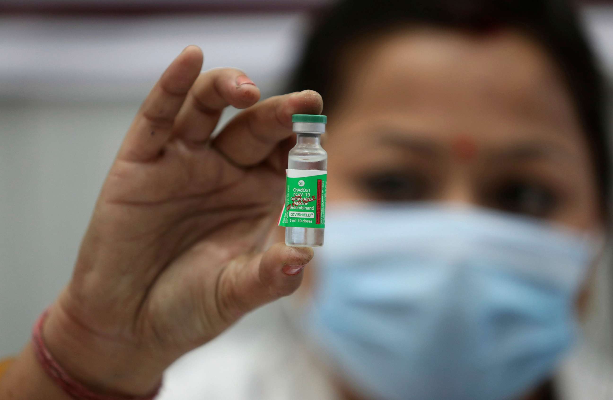 PHOTO: FILE - In this Saturday, Jan. 16, 2021, file photo, an Indian doctor shows a COVID-19 vaccine at a government Hospital in Jammu, India. India started exporting COVID-19 vaccines to its neighboring countries on Wednesday, Jan. 20. 