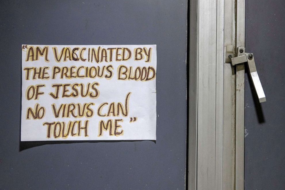 PHOTO: A poster is seen on a window at an emergency room where patients suffering from the coronavirus disease (COVID-19) are being treated, at Holy Family Hospital in New Delhi, India, May 1, 2021.