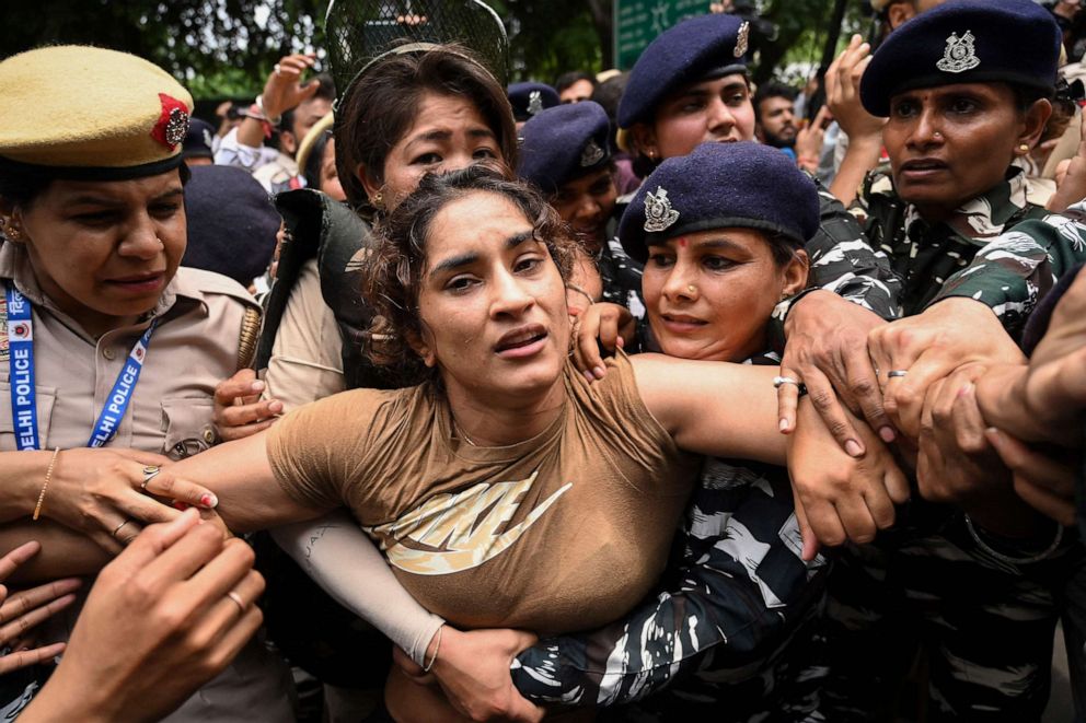 PHOTO: Indian wrestler Vinesh Phogat is detained by the police in New Delhi on May 28, 2023.