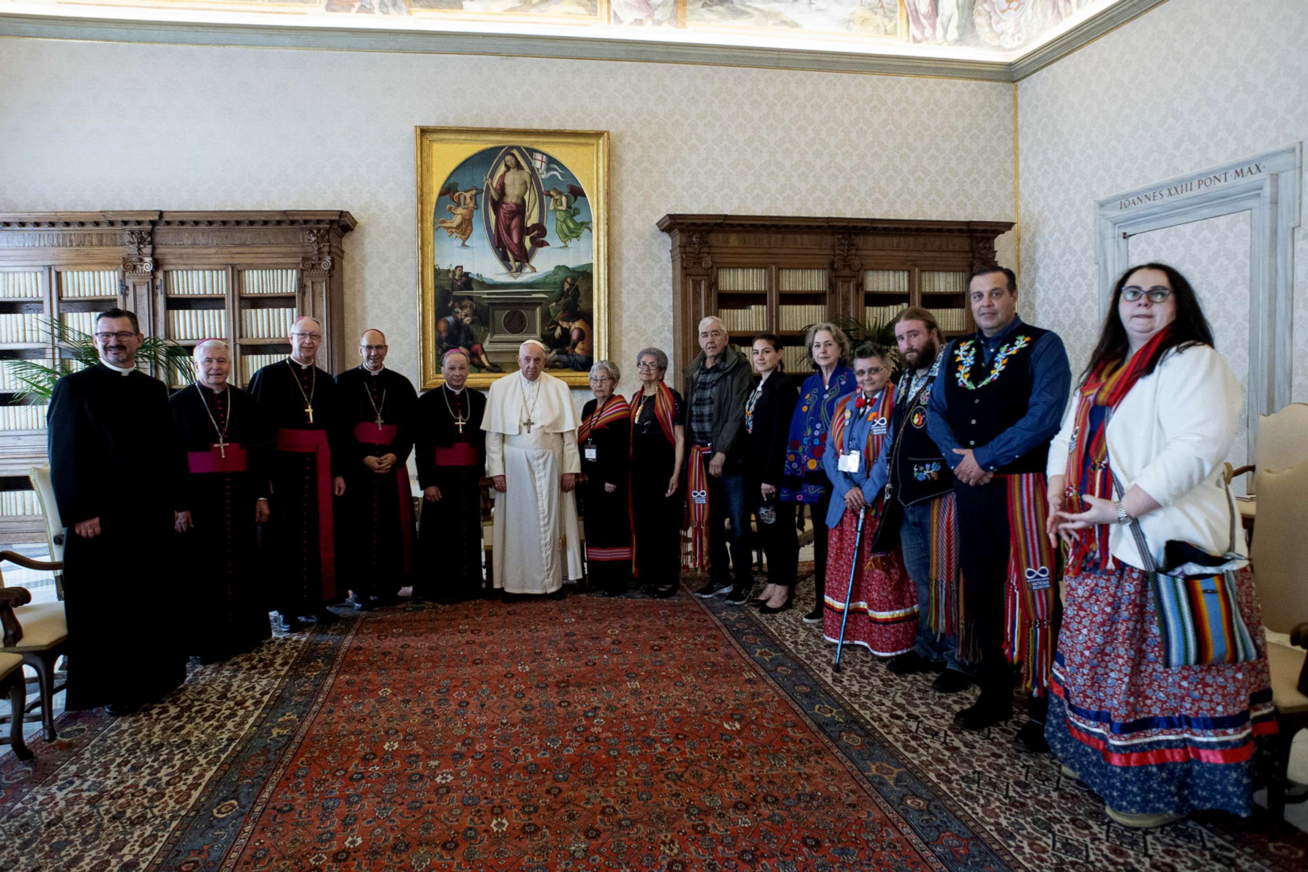 PHOTO: Pope Francis poses with two groups of representatives of Canadian indigenous peoples accompanied by some Bishops of the Bishops' Conference of Canada, at the Vatican, March 28, 2022.