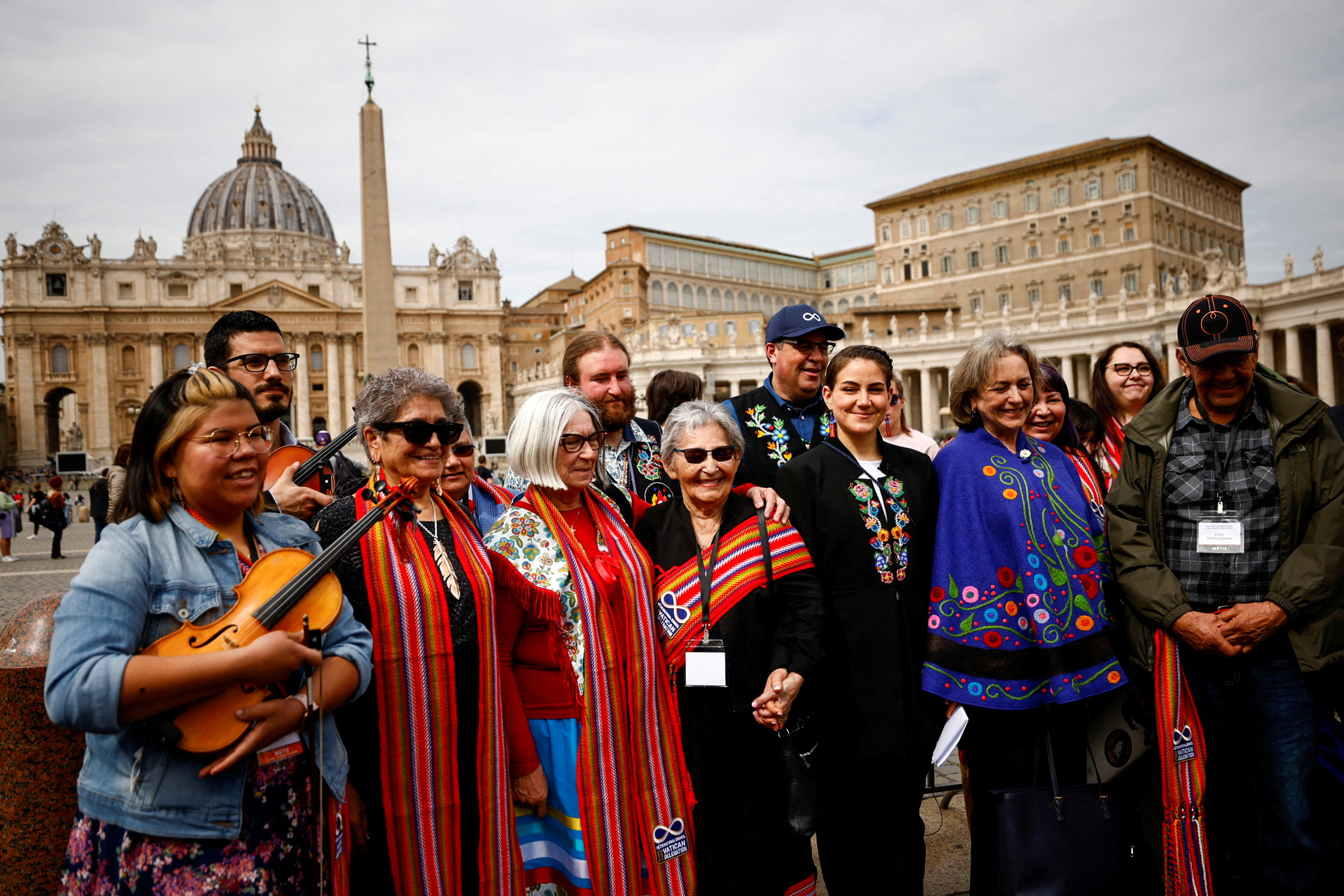 PHOTO: Metis National Council president Cassidy Caron poses for a group picture alongside Metis residential school survivor Angie Crerar and other delegates from Canada's indigenous peoples near St. Peter's Square at the Vatican, March 28, 2022.