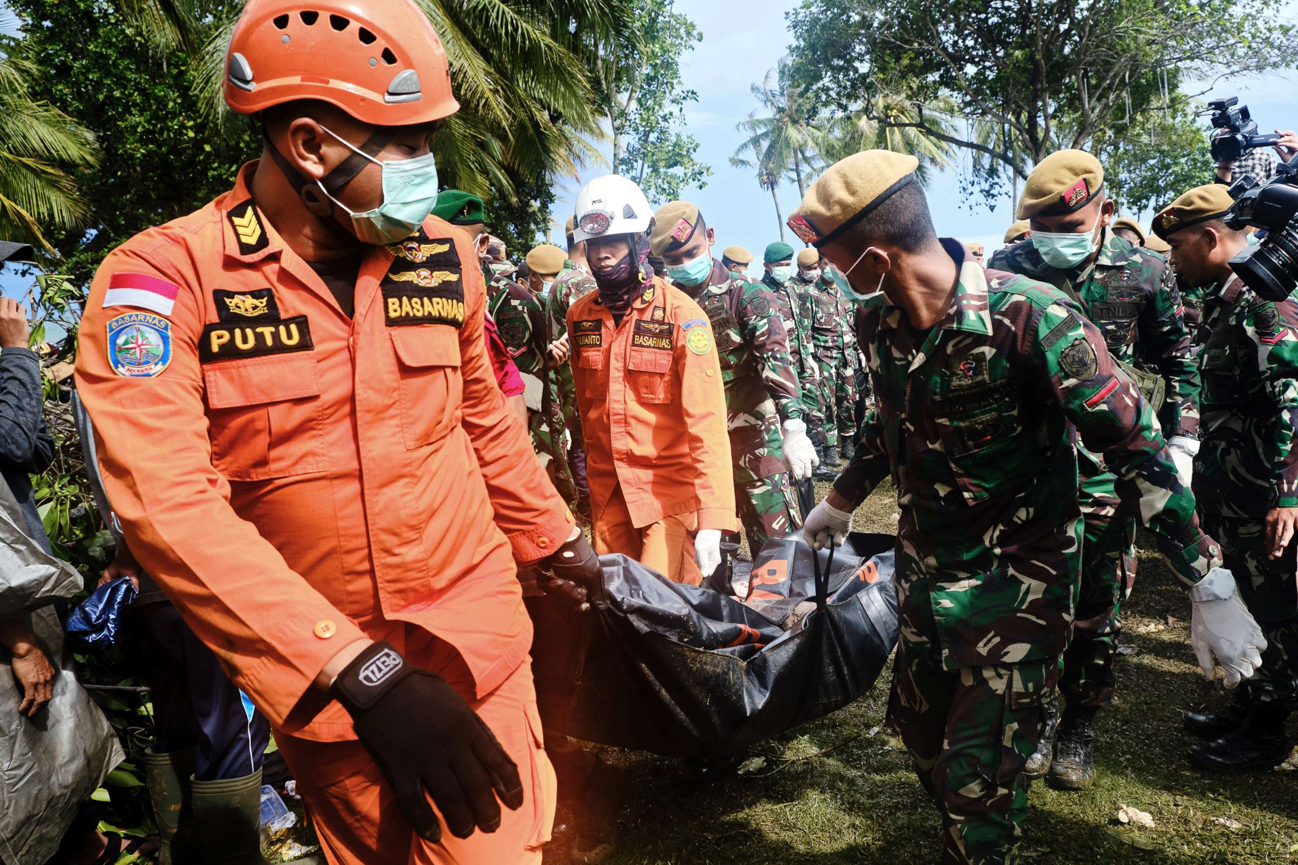PHOTO: Rescue workers recover the body of a victim of the tsunami during a search at a resort hotel on in Tanjung Lesung, Indonesia, Dec. 24, 2018.