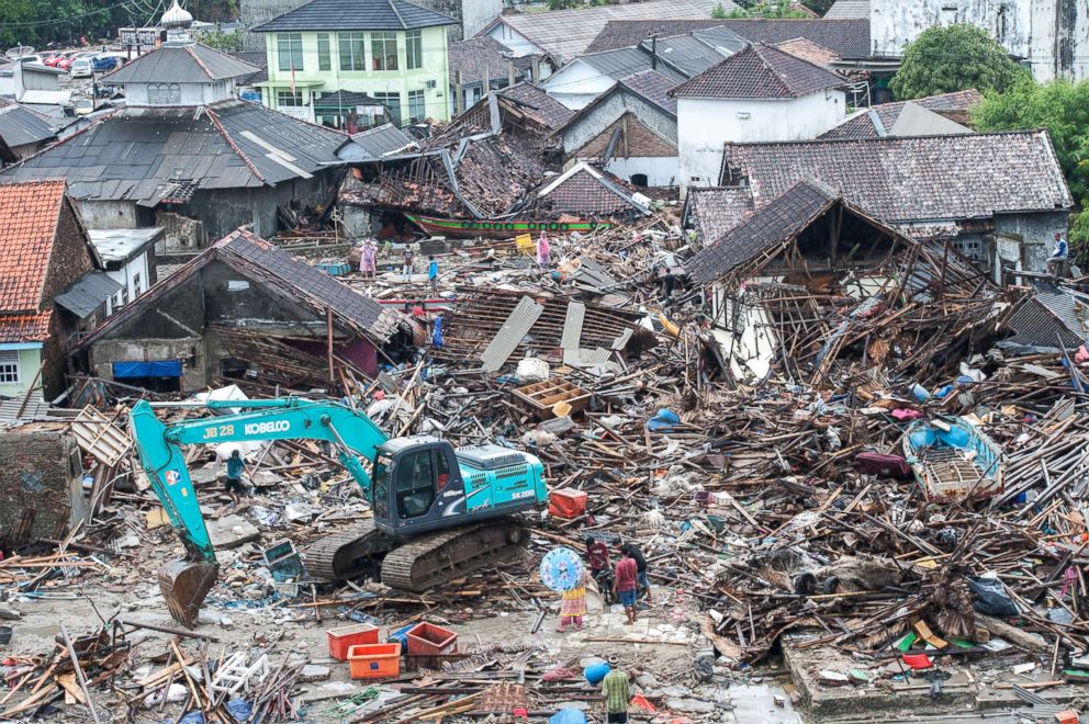 PHOTO: Locals clean debris at Sumur district of Pandeglang, Banten Province, in Indonesia, Dec. 24, 2018.