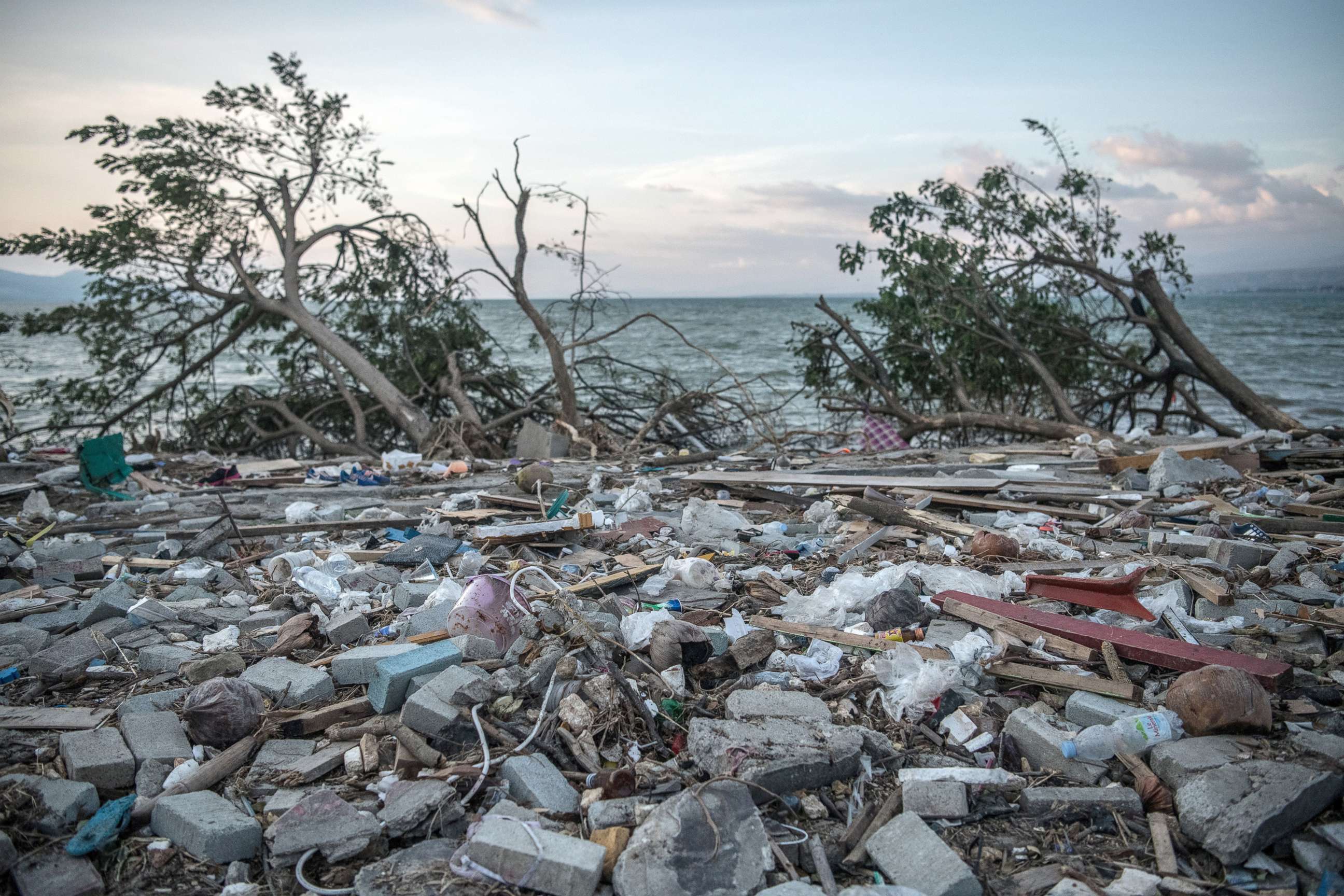 PHOTO: Debris and uprooted trees lie on the beach following a tsunami, Oct. 1, 2018, in Palu, Indonesia.