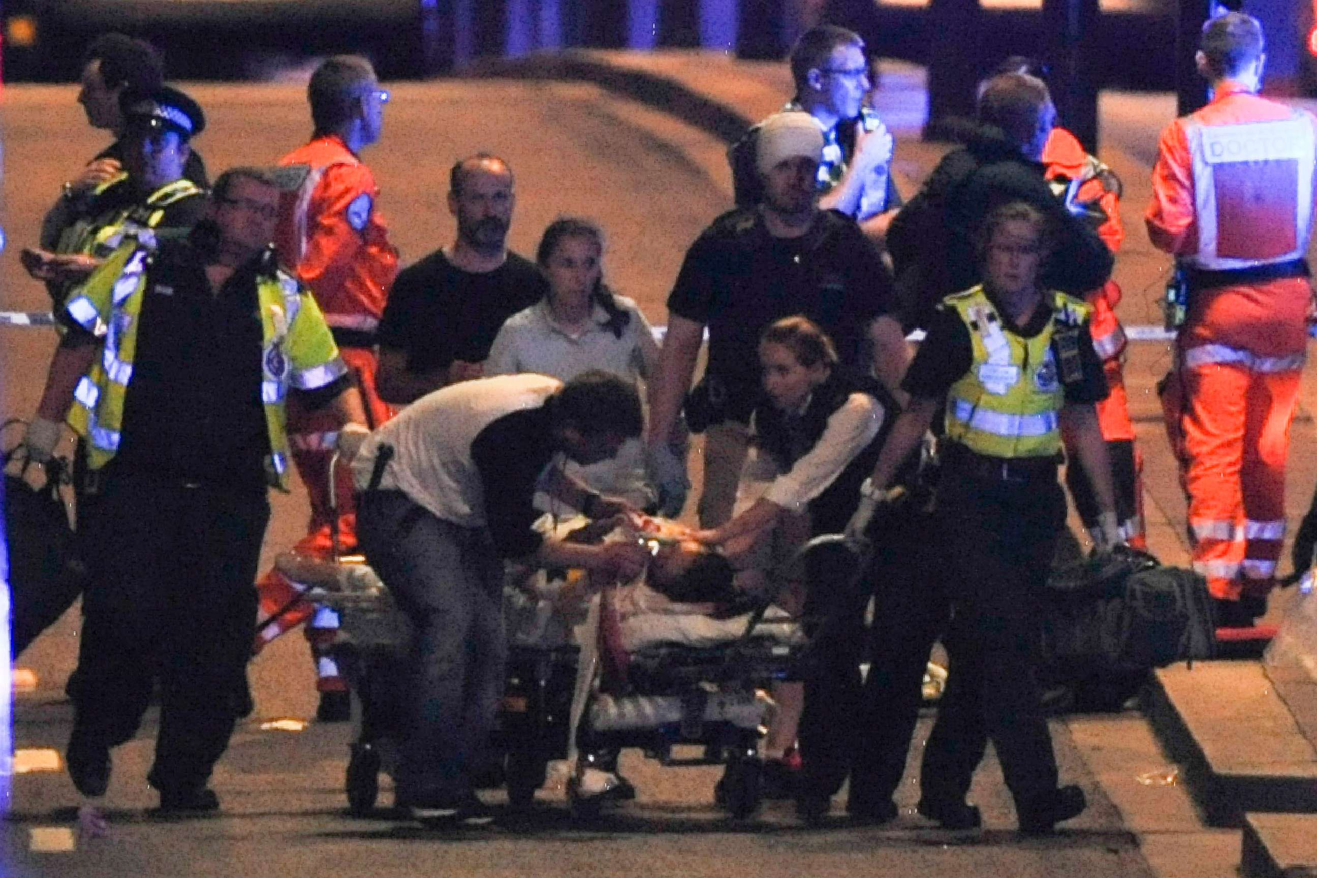 PHOTO: Police and members of the emergency services attend to victims of a terror attack on London Bridge in central London on June 3, 2017.