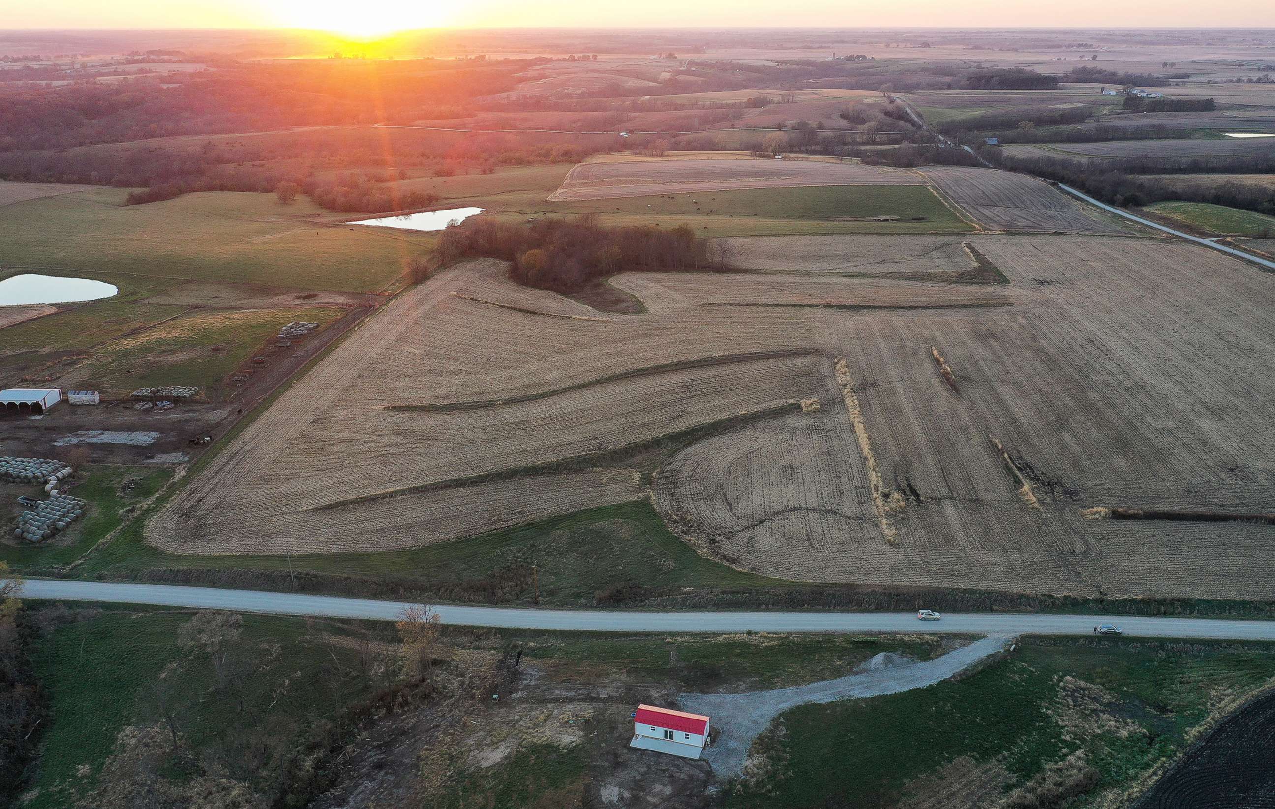 PHOTO: An aerial view of mostly harvested farmland at sunset, Oct. 30, 2020 in Lacona, Iowa.