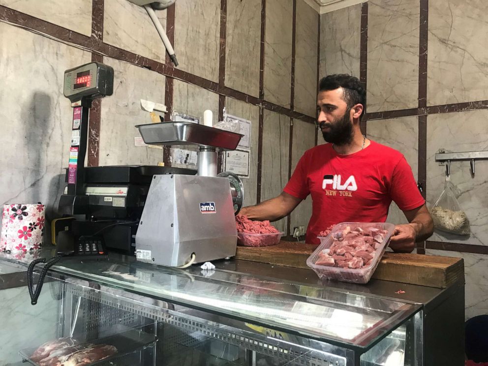 PHOTO: A butcher in Iran's capital, Tehran, handles meat on June 2, 2019. The price of meat has doubled as the rial's value has fallen in the wake of the United States reimposing sanctions on the Iran and pulling out of the Iranian nuclear deal.