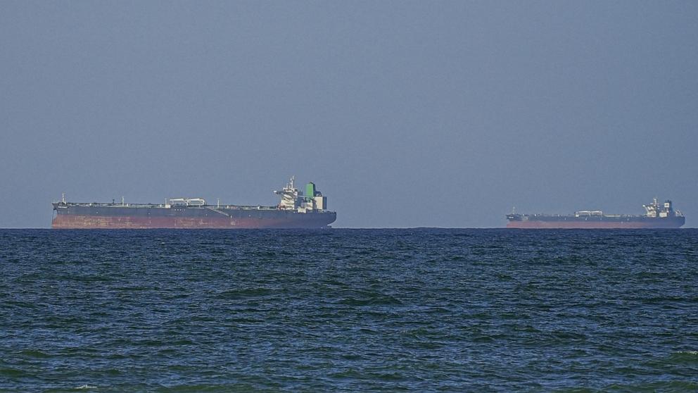 PHOTO: A view of the vessels passing through Strait of Hormuz following the two-week temporary ceasefire reached between the United States and Iran on the condition that the strait be reopened, seen in Oman, April 8, 2026.