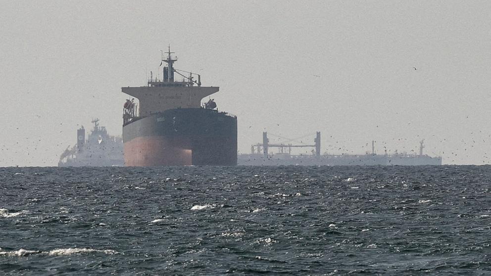 PHOTO: Cargo ships in the Gulf, near the Strait of Hormuz, as seen from northern Ras al-Khaimah, near the border with Oman's Musandam governance, amid the U.S.-Israeli conflict with Iran, in United Arab Emirates, March 11, 2026.