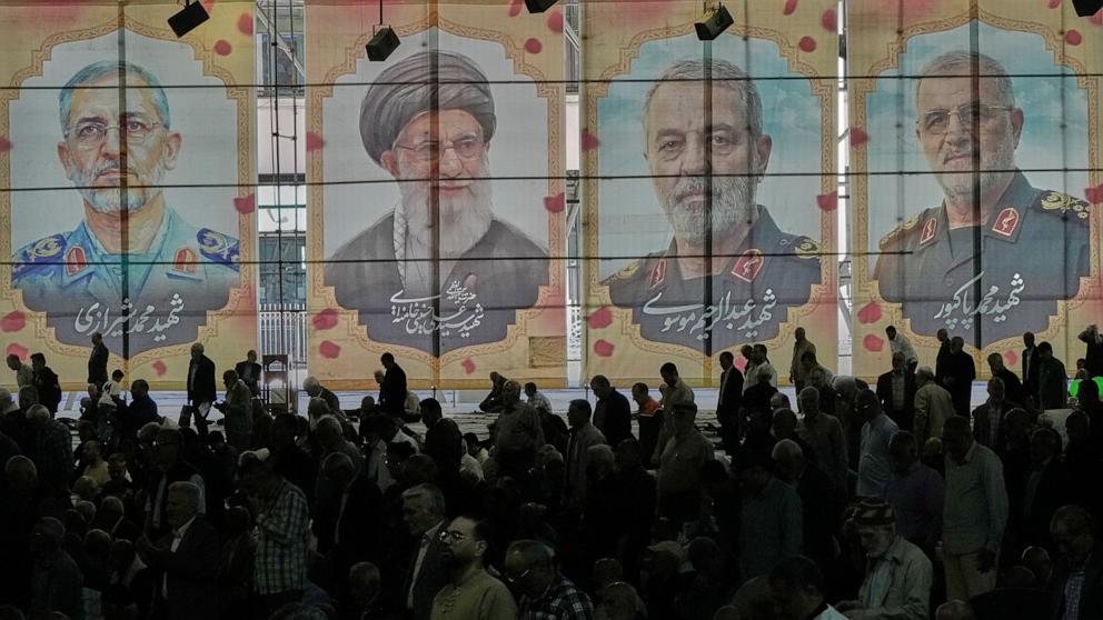 PHOTO: Iranian worshippers perform Friday prayers under the portraits of the late Iranian Supreme Leader Ayatollah Ali Khamenei and top military officials who were killed during the U.S.-Israel campaign, at the Tehran University in Tehran, April 24, 2026.