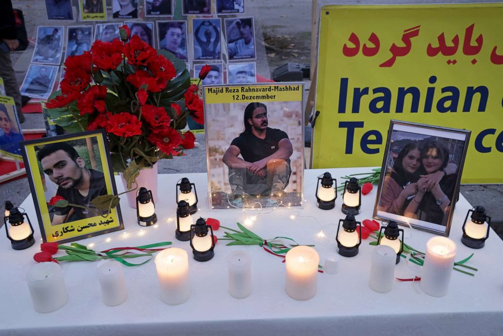 PHOTO: Portraits of Majid Reza Rahnavard, 23, and Mohsen Shekari, 23, both of whom were recently executed by Iranian authorities, and Mahsa Amini stand on a table among candles during a demonstration, Dec. 12, 2022 in Berlin.