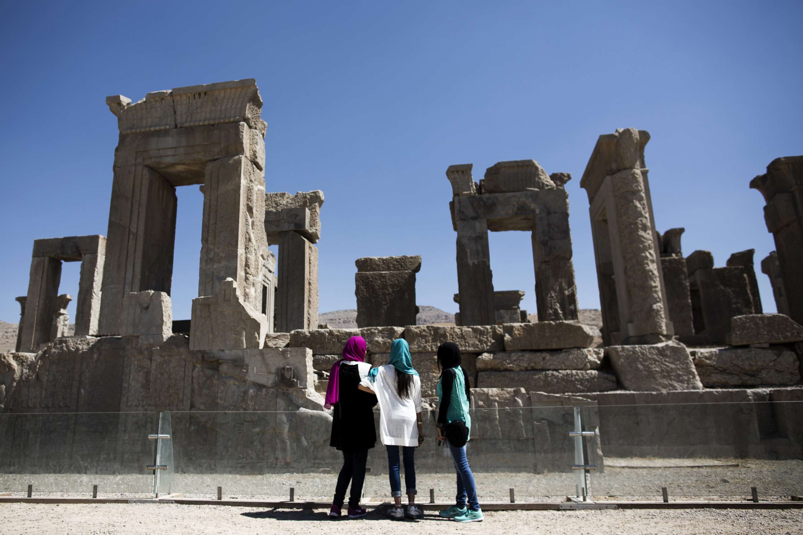 PHOTO: Iranian women look at the palace of King Darius of Achaemenid (522-486 B.C.) in the ancient Persian city of Persepolis near Shiraz in Iran on Sept. 26, 2014.