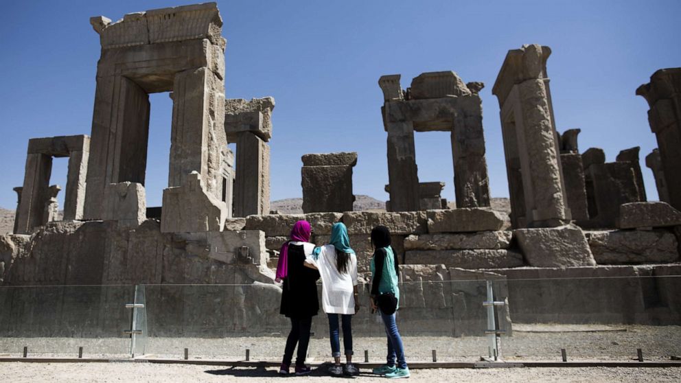 PHOTO: Iranian women look at the palace of King Darius of Achaemenid (522-486 B.C.) in the ancient Persian city of Persepolis near Shiraz in Iran on Sept. 26, 2014.