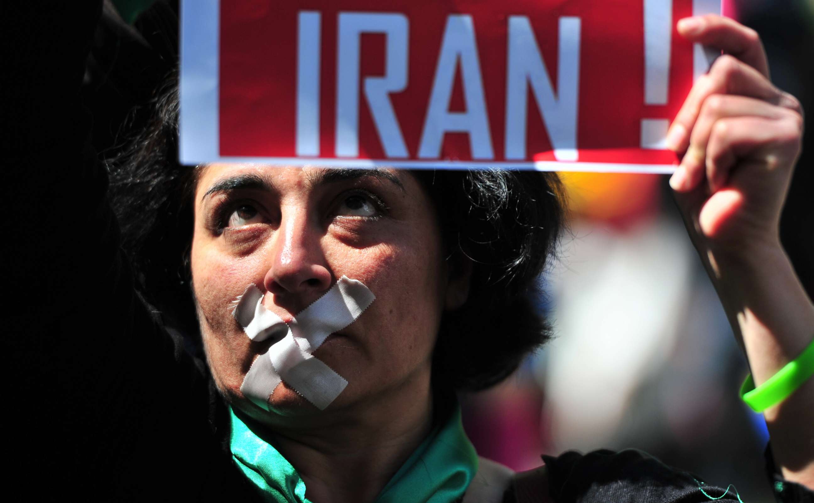PHOTO: A woman demonstrates against the situation in Iran during the Christopher Street Day gay pride parade in Berlin on June 19, 2010.
