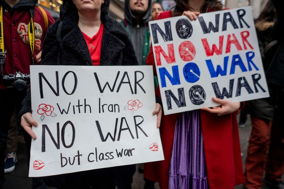 PHOTO: Protestors hold anti-war with Iran rally signs at Herald Square, Jan. 4, 2020, in New York.