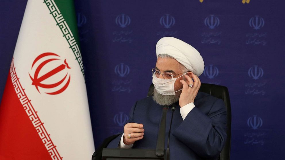 PHOTO: In this photo released by the official website of the office of the Iranian Presidency, President Hassan Rouhani adjusts his face mask in a meeting of the national headquarters of the fight against the COVID-19, in Tehran, Iran, July 18, 2020.