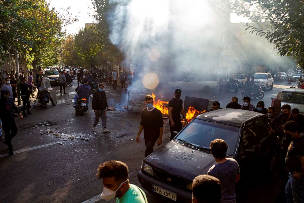 PHOTO: Iranians protest the death of 22-year-old Mahsa Amini after she was detained by the morality police last month, in Tehran, on Oct. 27, 2022.