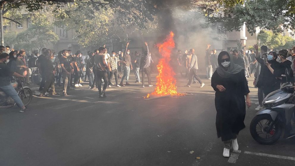 PHOTO: In this Oct. 1, 2022, file photo, Iranian protesters march down a street in Tehran, Iran.