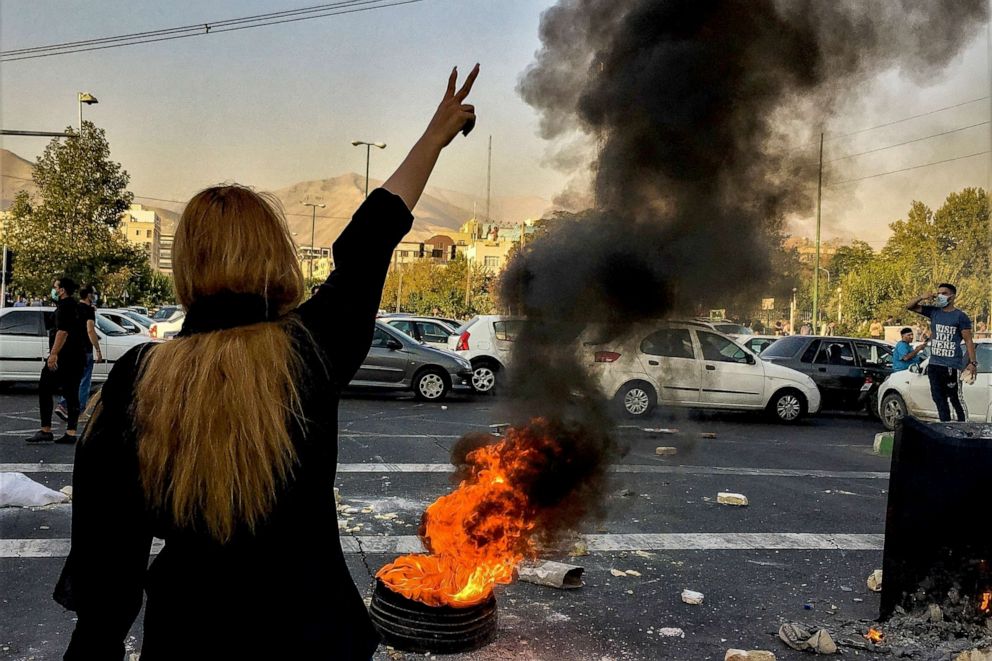 PHOTO: Iranians protests the death of 22-year-old Mahsa Amini after she was detained by the morality police, in Tehran, Iran, Oct. 1, 2022. 