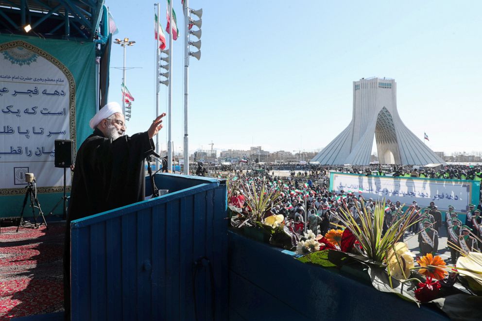 PHOTO: Iranian President Hassan Rouhani salutes the crowd during the commemoration of the 41st anniversary of the Islamic revolution in Tehran, Iran Feb. 11, 2020.