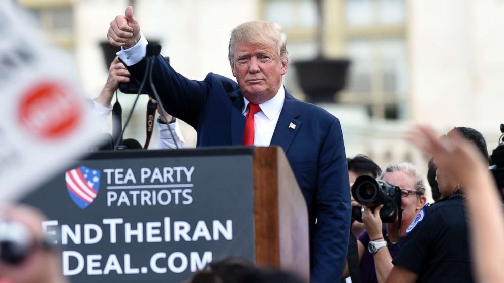 Then-Republican Presidential candidate Donald Trump gives a thumbs up to the crowd after speaking during a rally opposing the Iran nuclear deal outside the Capitol, Sept. 9, 2015.