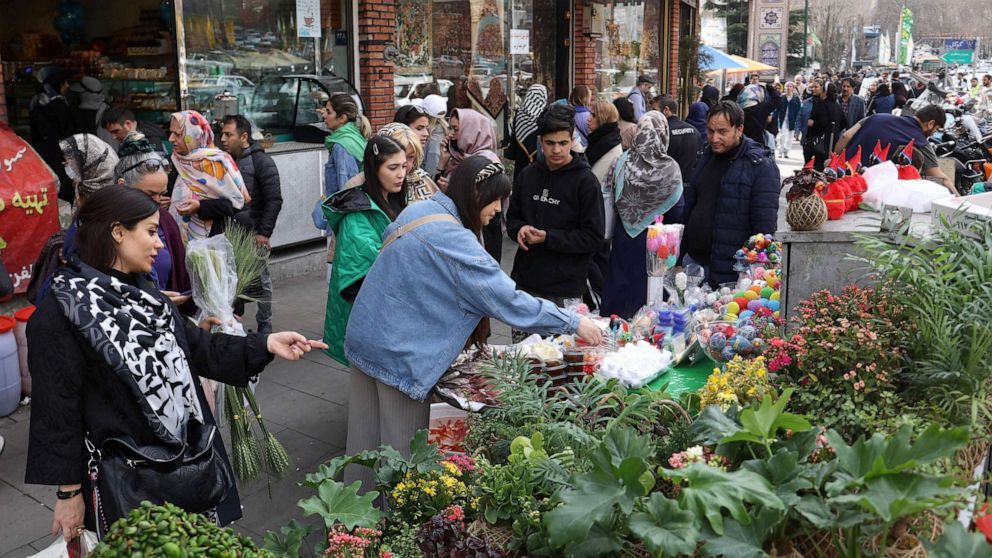 PHOTO: Iranian women shop at the Tajrish Bazaar, ahead of Nowruz, the Iranian New Year, in Tehran, Iran March 15, 2023.