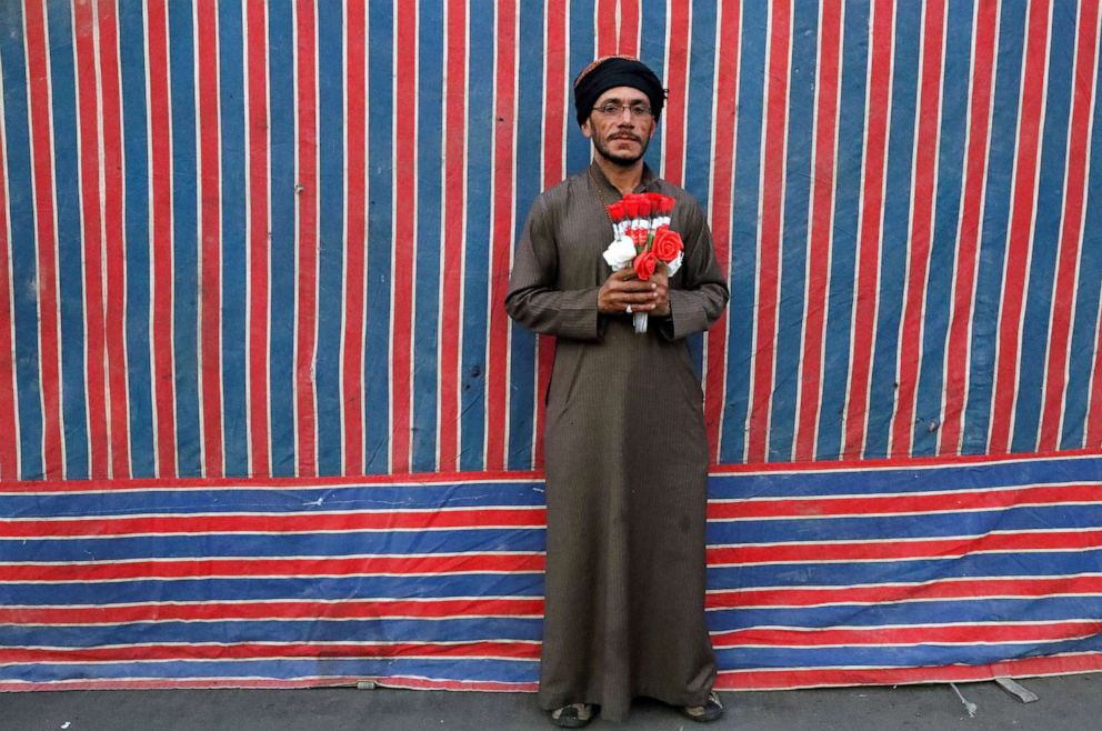 PHOTO: Yasir 'Idan, an Iraqi demonstrator, poses for a photograph during the ongoing anti-government protests in Baghdad, Iraq, November 11, 2019. Picture taken November 11, 2019.