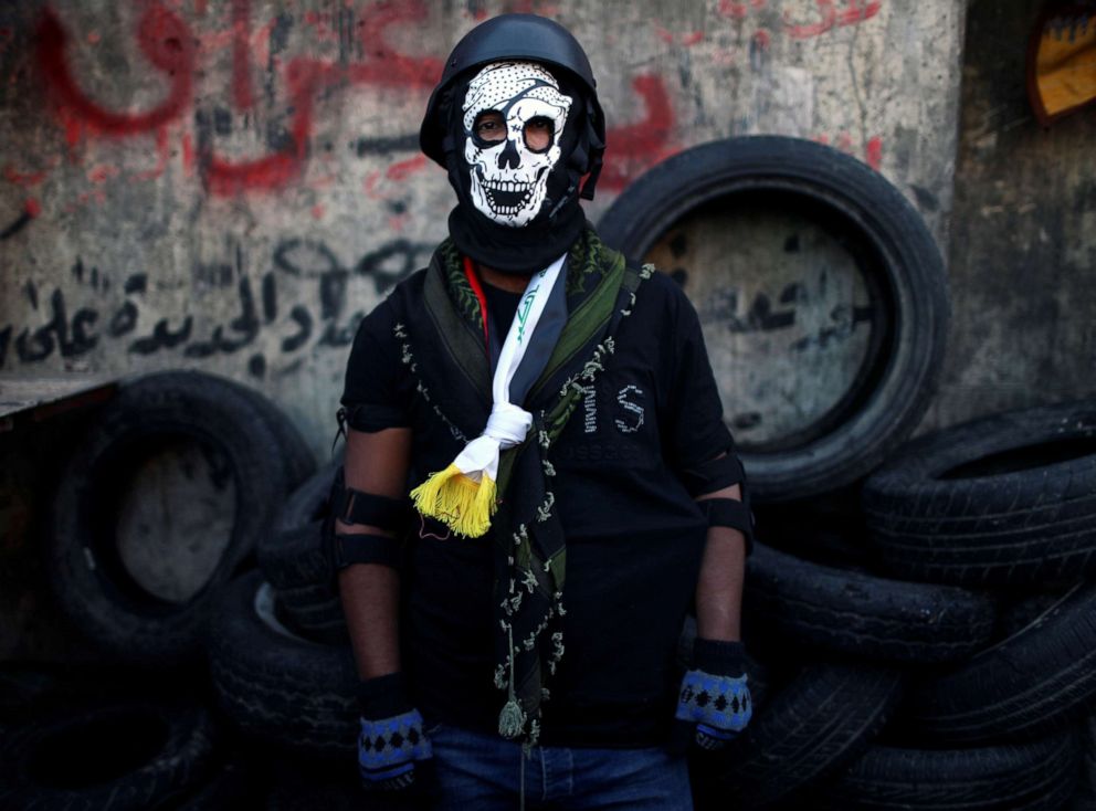 PHOTO: Hossam, an Iraqi demonstrator, poses for a photograph during the ongoing anti-government protests in Baghdad, Iraq, November 5, 2019. Picture taken November 5, 2019.