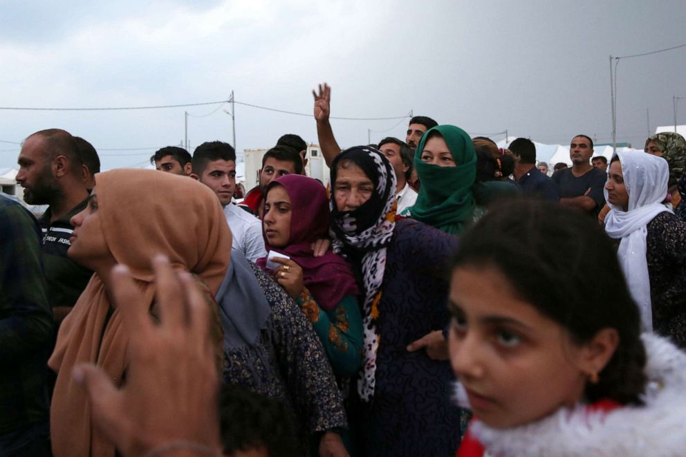 PHOTO: Syrian people who fled the conflict areas arrive at Bardarash refugee camp, in South of Duhok, Kurdistan region, Iraq, Oct. 21, 2019.