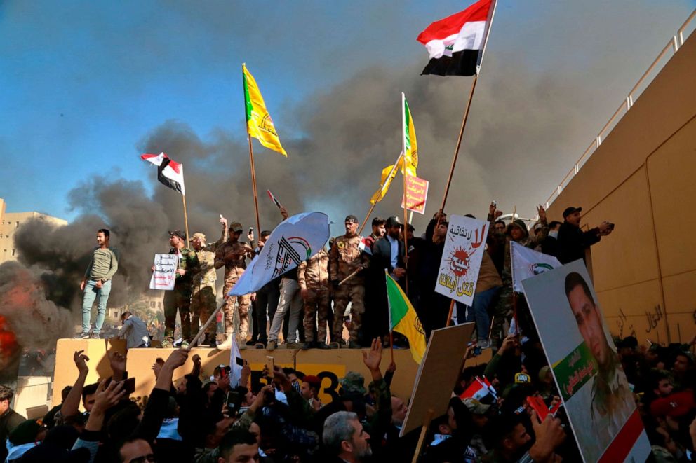 PHOTO: Protesters burn property in front of the U.S. embassy compound, in Baghdad, Dec. 31, 2019.